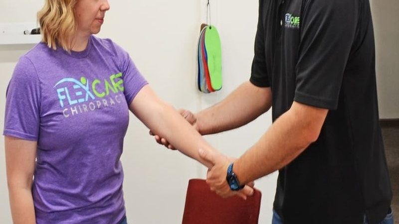 Chiropractic adjustment in progress at Flex Care Chiropractic