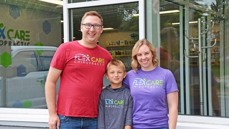Dr. Zach Chudy with his family outside the Oconomowoc clinic